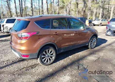 2017 Ford Escape Titanium z USA, uszkodzony, nr VIN 1FMCU9JD1HUA56973